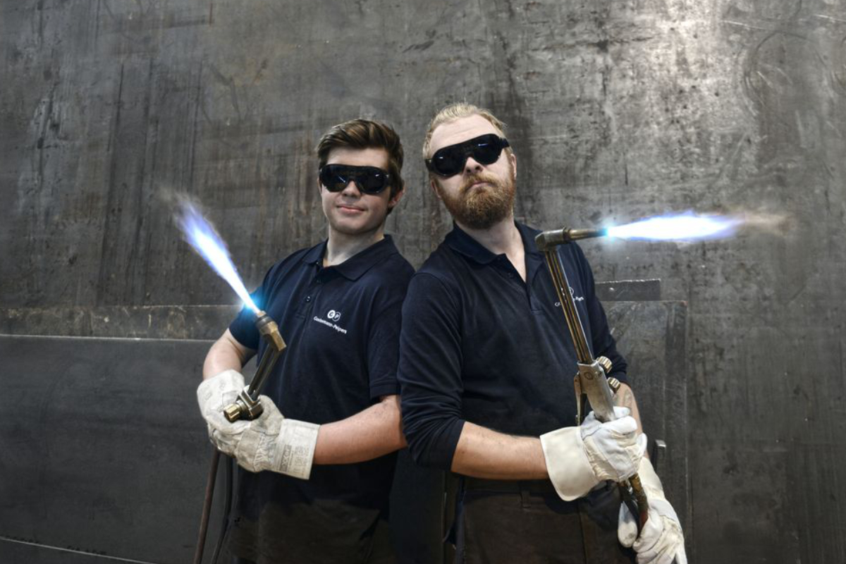 Teamfoto, Konstruktionsmechaniker, Metallindustrie, Gießerei, Eisen, Siegen, Mannschaft, Mitarbeiter, Gussprodukte